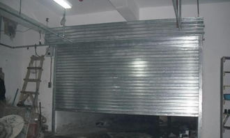 專業(yè)安裝維修制作卷簾門車庫(kù)門白鋼門型材門肯德基門